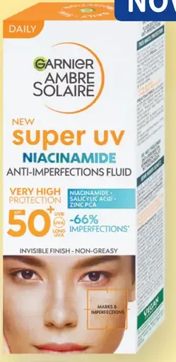 Garnier Ambre Solaire Super UV Niacinamide denný pleťový fluid s OF 50+