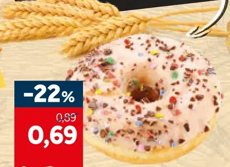 Donut biely s drvenými cukríkmi
