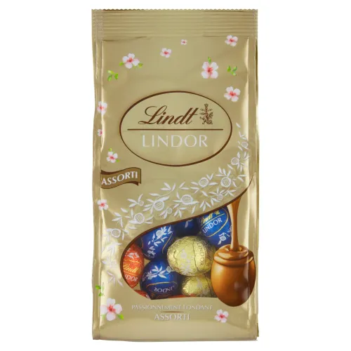 Lindt Lindor Zmes mliečnej, horkej a bielej čokolády s jemnou tekutou náplňou